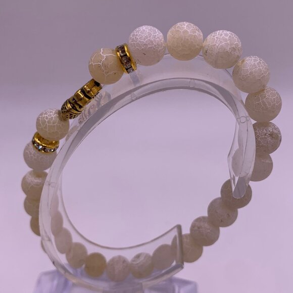 🐱 5 FOR $10.  WHITE BEAD STRETCH BRACELET W/GOLD ELEPHANT ACCENT - Picture 4 of 4